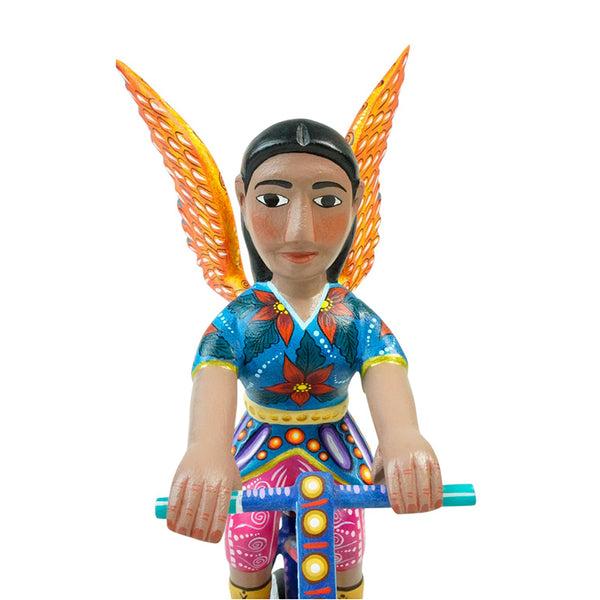 ON SALE Agustin Cruz Jr: Saint Michael Archangel on Bicycle Woodcarving