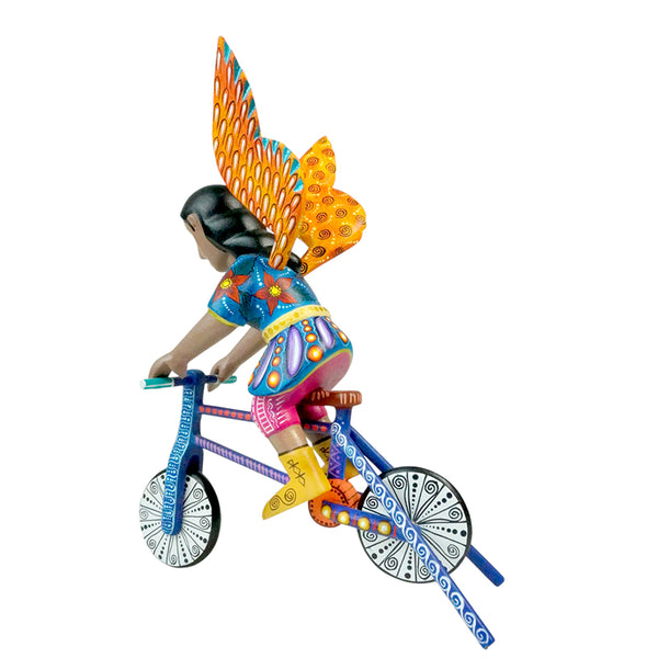 ON SALE Agustin Cruz Jr: Saint Michael Archangel on Bicycle Woodcarving