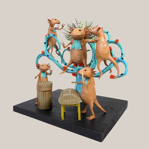 Antonio Alonso axolotl emperor and four musicians, papier-mâché sculpture, angled view on a warm gray background.