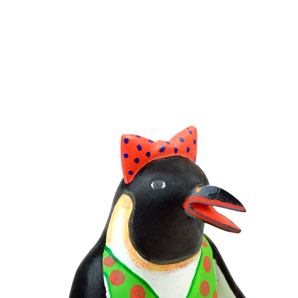 Avelino Perez: Penguin Lady Woodcarving