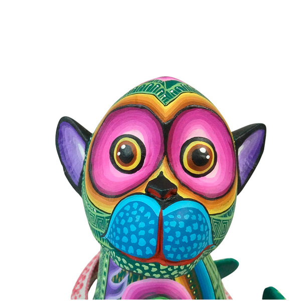 Brightly painted monkey wood figurine