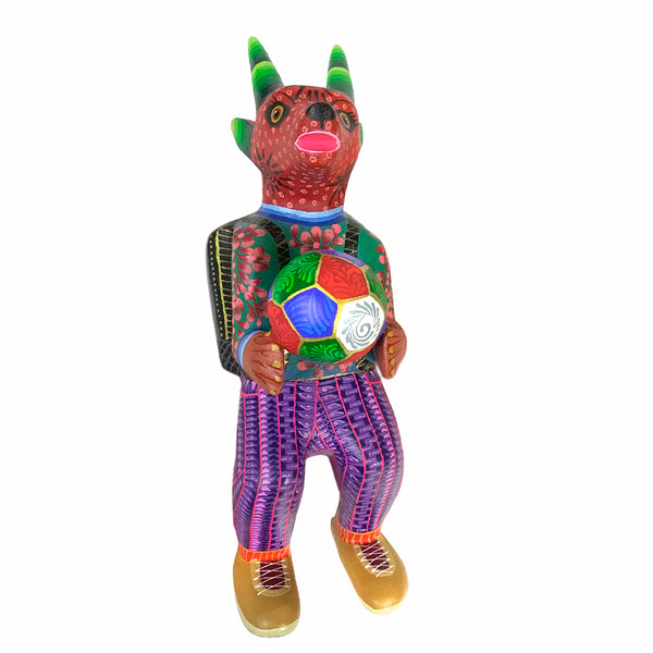 Dante Cruz: Goat Soccer Player Woodcarving