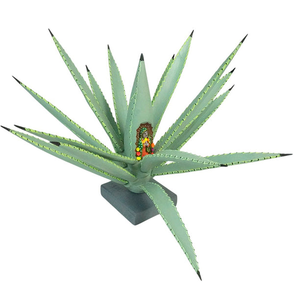 Our Lady of Guadalupe carved onto a wood agave plant