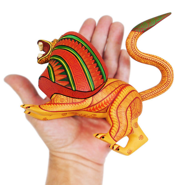 Lion Alebrije wood handcrafted from copal wood in Oaxaca Mexico