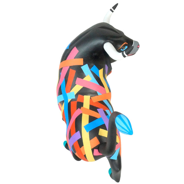 Mexican wood sculpture of a bull