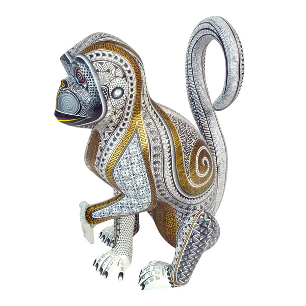 Manuel Cruz: Golden Glyphs Monkey Woodcarving