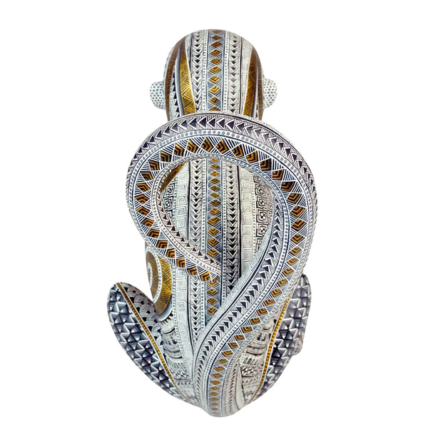 Manuel Cruz: Golden Glyphs Monkey Woodcarving