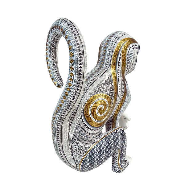 Manuel Cruz: Golden Glyphs Monkey Woodcarving