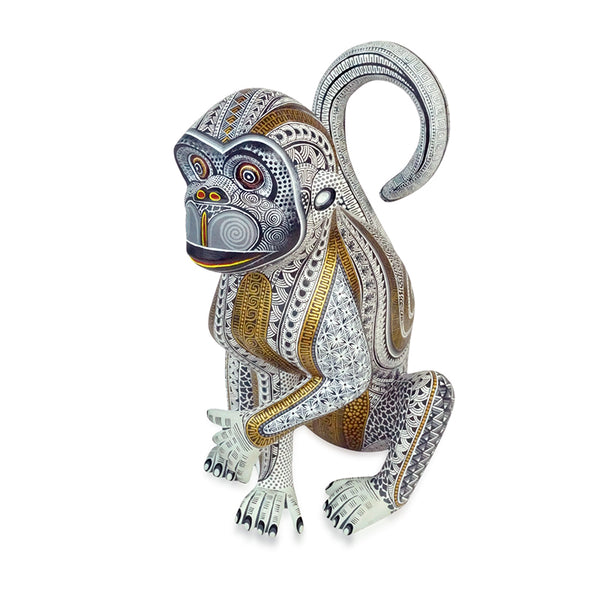 Manuel Cruz: Golden Glyphs Monkey Woodcarving