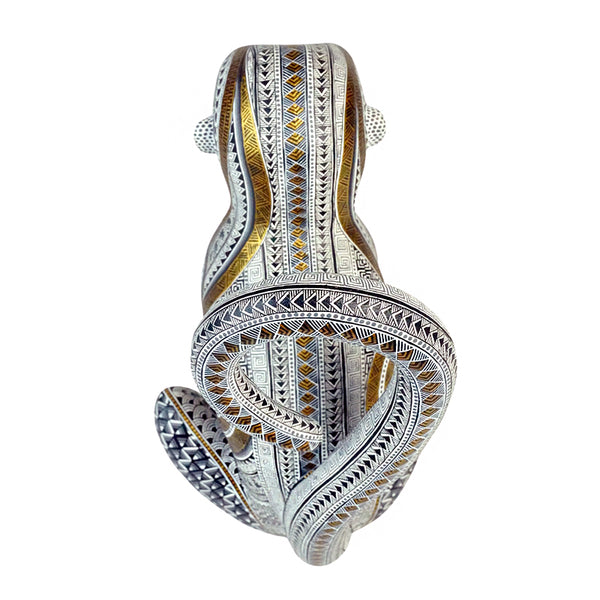 Manuel Cruz: Golden Glyphs Monkey Woodcarving