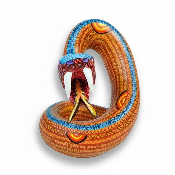 Mario Castellanos: Rattlesnake Woodcarving