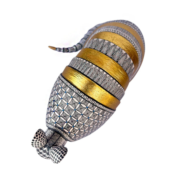 Nicolas Morales: Gold Leaf Armadillo Woodcarving