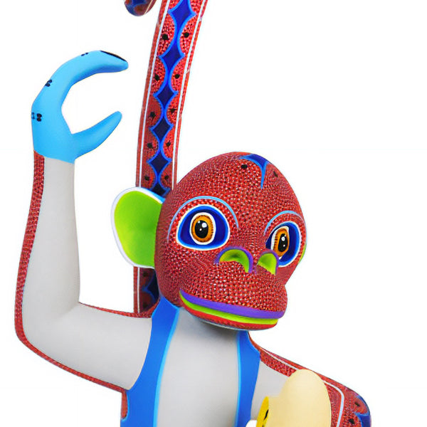 Monkey with a banana alebrije hand-carved in Mexico
