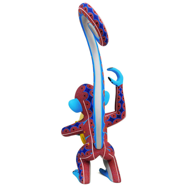 Narciso Gonzalez: Mischievous Monkey with Banana Sculpture