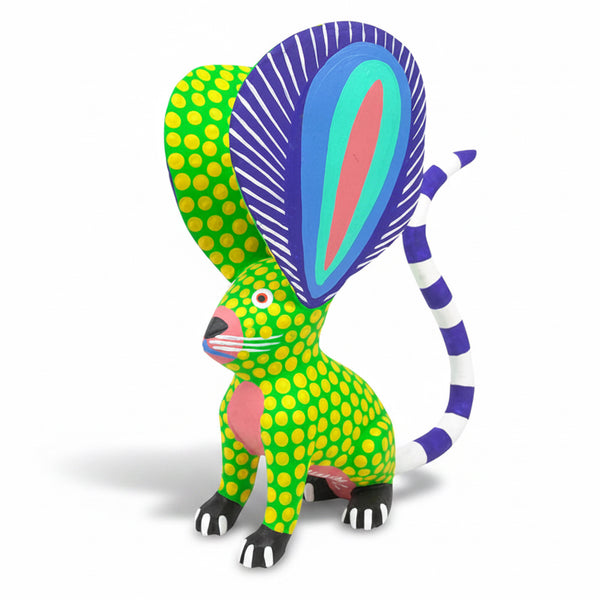 Colorful Alebrije mouse figurine with polka dot pattern on a white background
