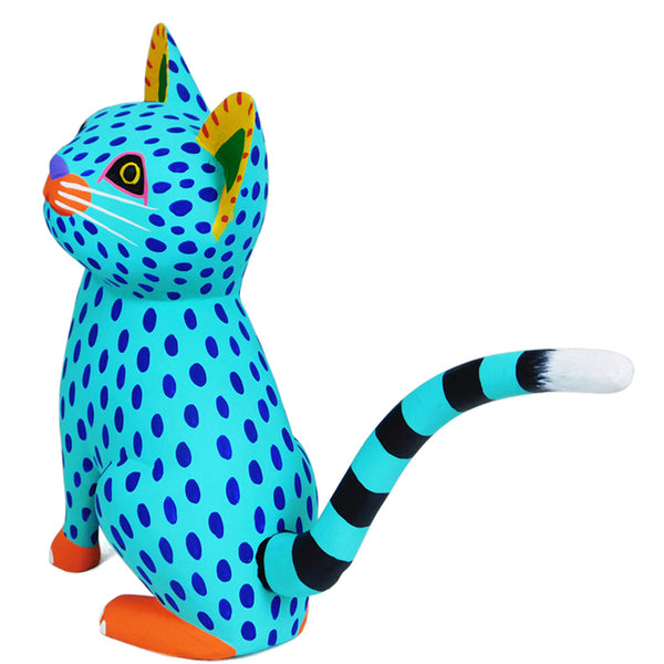 Oaxacan woodcarving of a turquoise cat