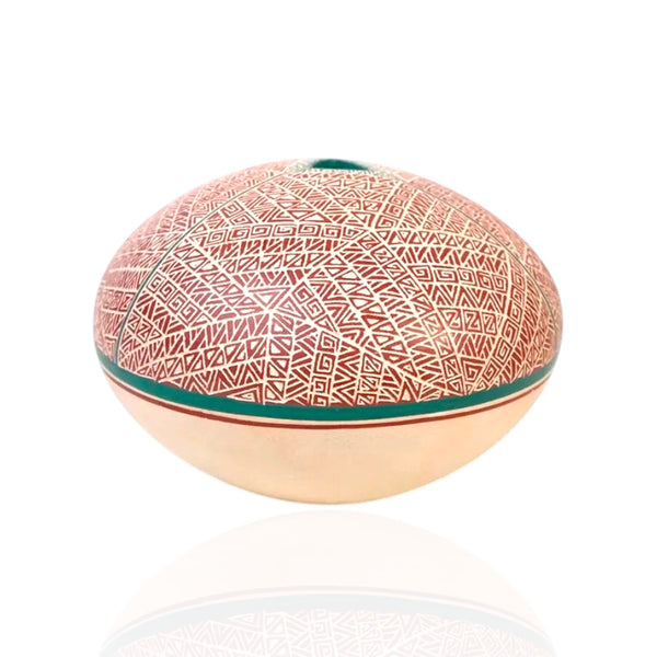Mata Ortiz seed pot with fine hand-etched geometric sgraffito design in deep red and cream, teal rim opening, natural clay base