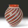 Mata Ortiz handmade Ceramic vase with geometric pattern on a gradient background