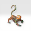 Authentic signed monkey woodcarving on a white background