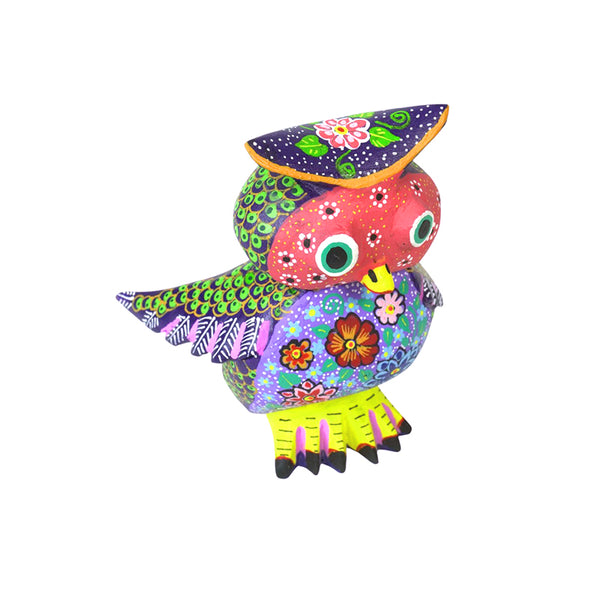 Hand-carved copal wood owl alebrije by Candido Jiménez, purple body with floral details, Oaxacan folk art
