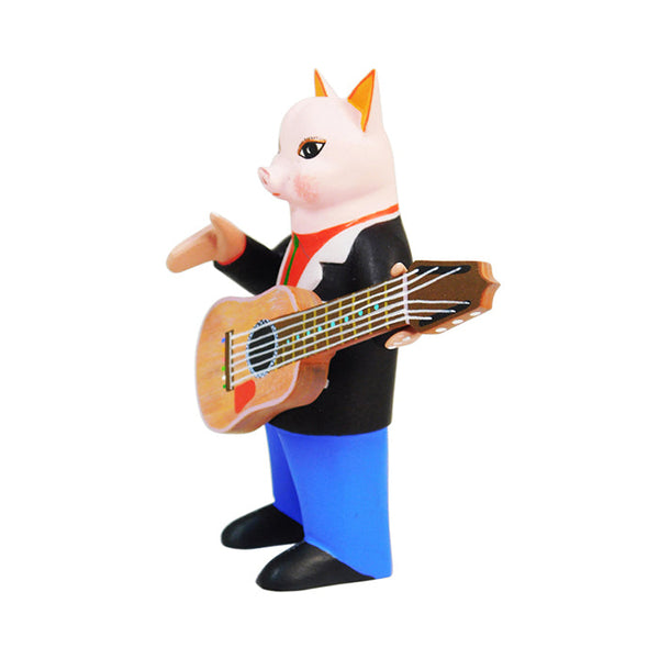 Avelino Perez: Guitarist Pig  Woodcarving