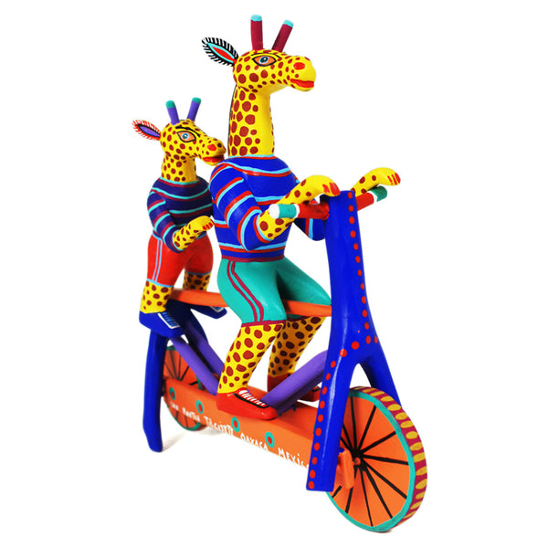 Martin Melchor: Giraffes Father & Son Riding Bicycle