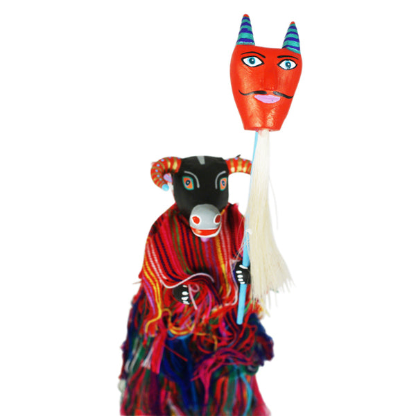 Martin Melchor: Cow on Stilts with Devil Mask