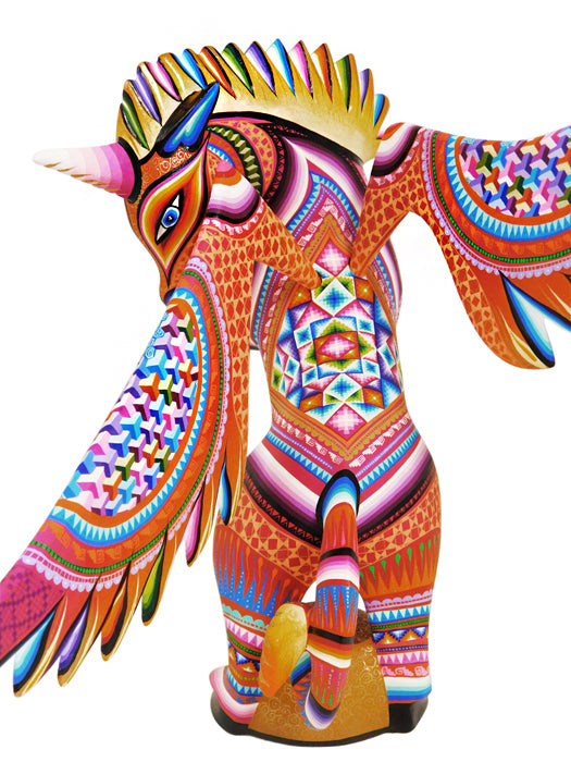 Lucero Fuentes: Unicorn Woodcarving