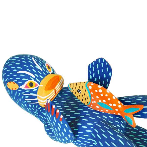 Moises Jïmenez: Otter with Fish  Woodcarving